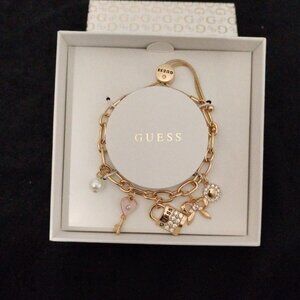 Guess Gold Tone 4 Charms Bangle Bracelet  NIB